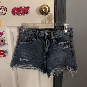 Distressed denim shorts